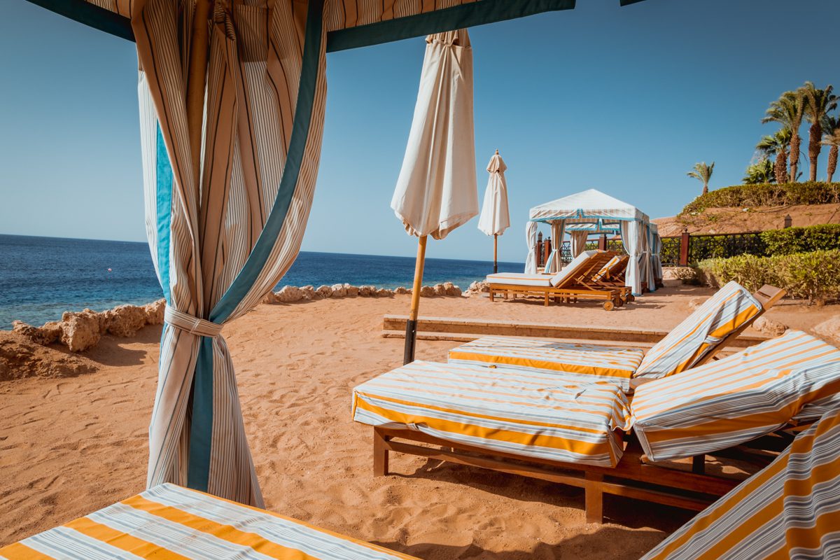 Shaded cabana and sun loungers on the beach at Four Seasons Resort Sharm el Sheikh