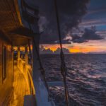 Sunset seen from the deck with the rigging silhouetted