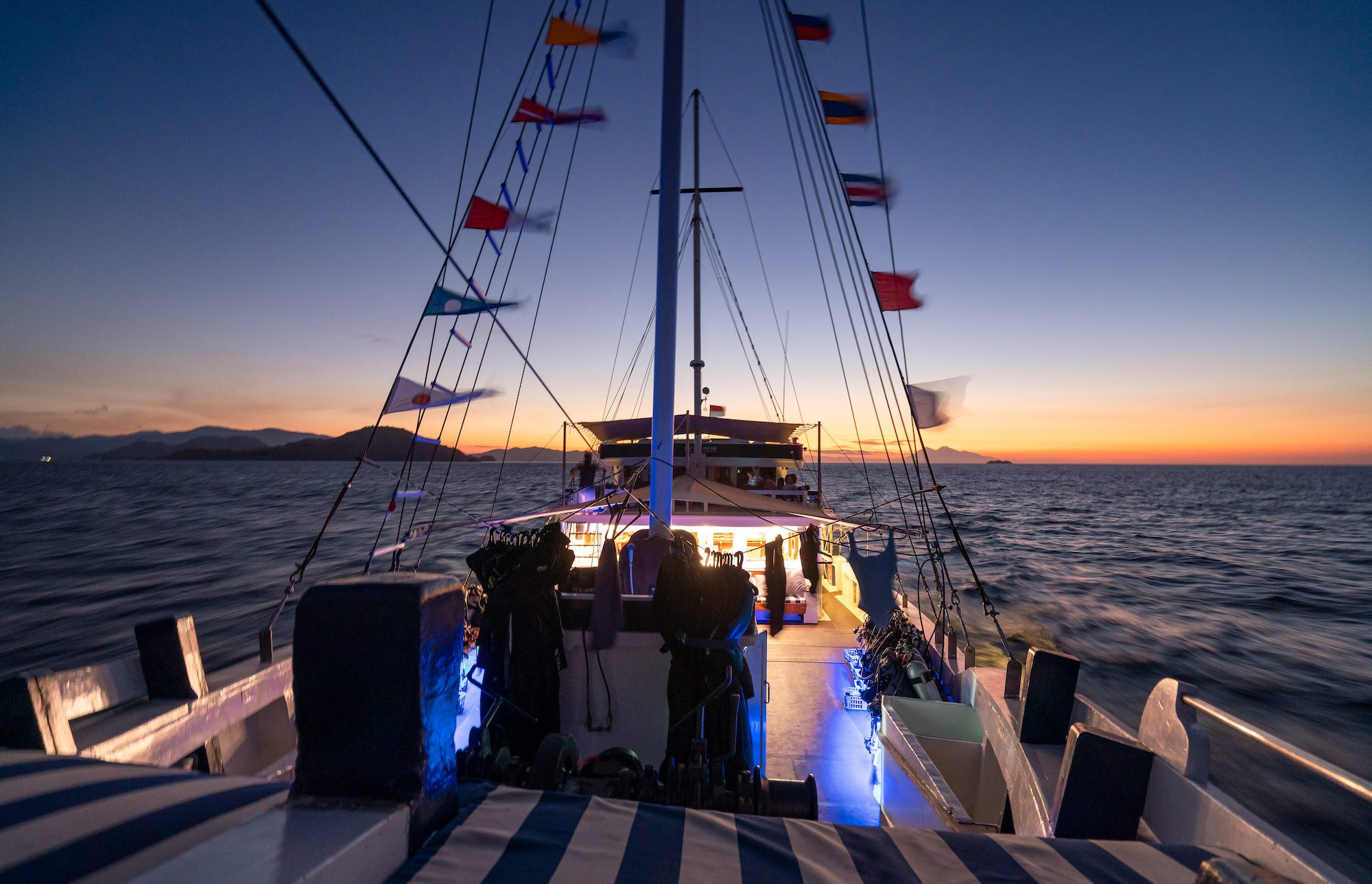 The Seahorse liveaboard, a traditional Phinisi, at anchor