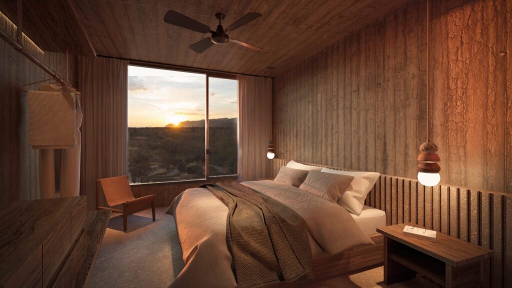 Rendering of a villa bedroom at Paradero Villas Todos Santos, with rammed-earth walls, a timber ceiling and a picture window onto the desert at sunset