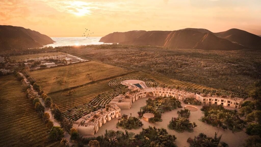 Rendering of the 160-acre Paradero Todos Santos estate at sunset, farmland in the foreground and the Pacific coast beyond