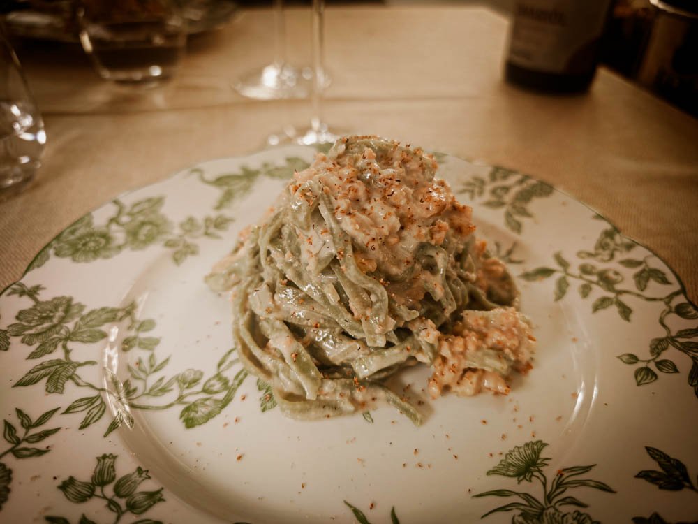 Green tagliatelle with ragu at Al Cambio restaurant in Bologna, Italy