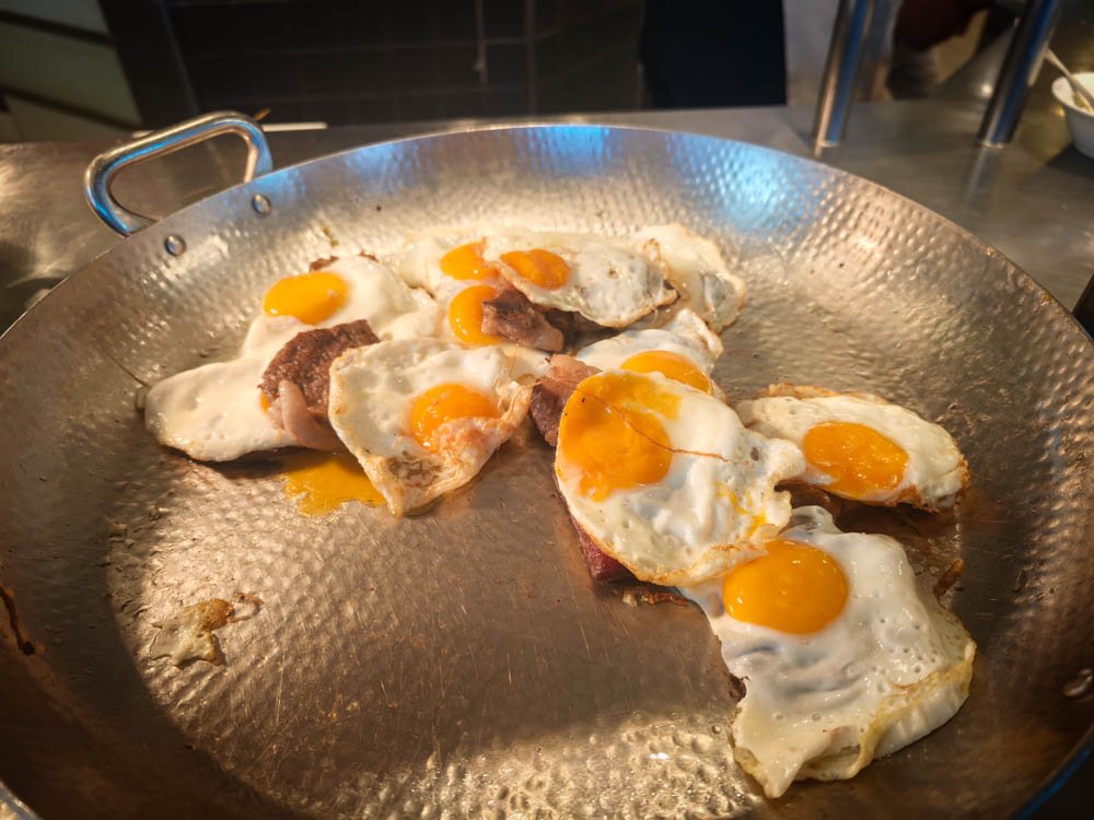 Fried eggs cooked to order at breakfast on Celebrity Constellation