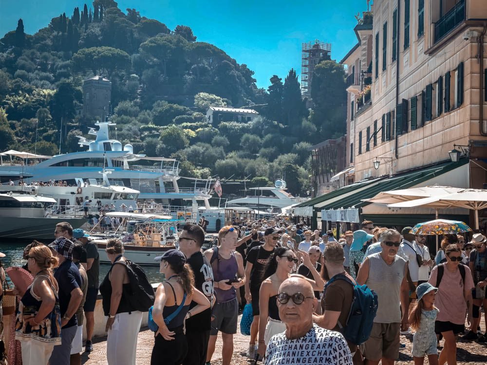 Crowds on the waterfront at Portofino, Italy