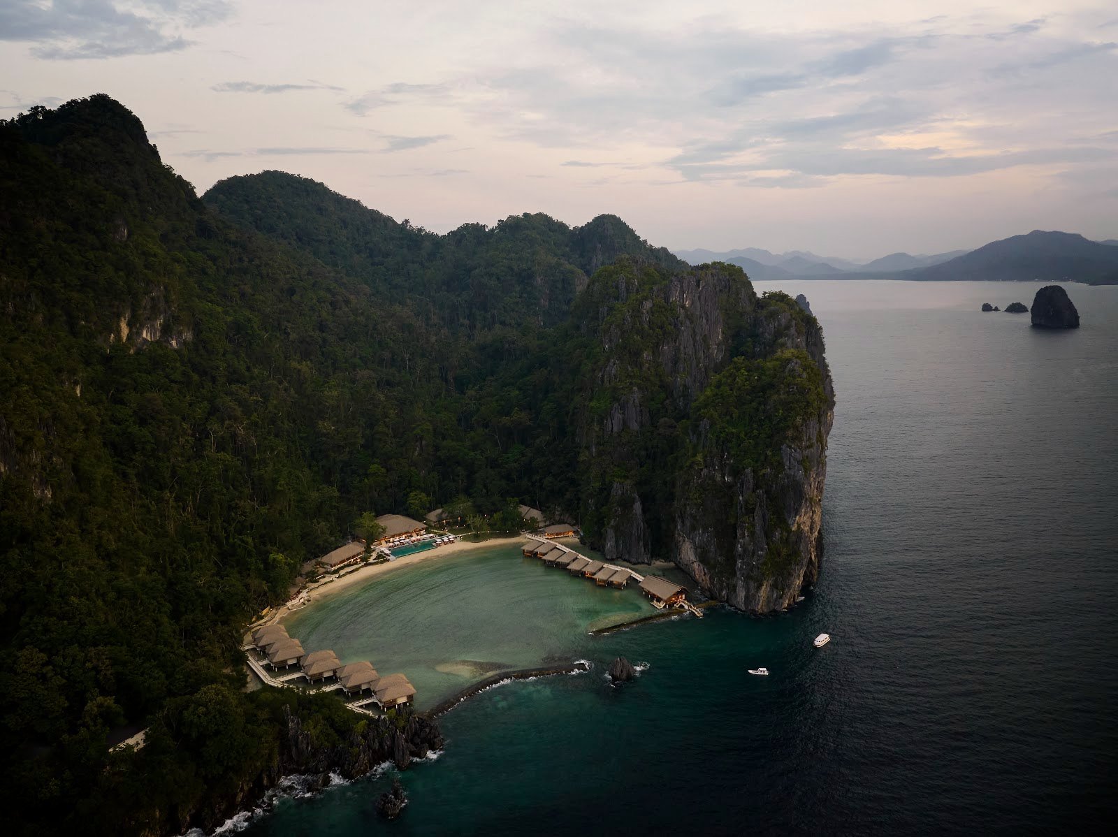 Aerial view of El Nido Lagen Island Resort private island with overwater villas, Palawan Philippines