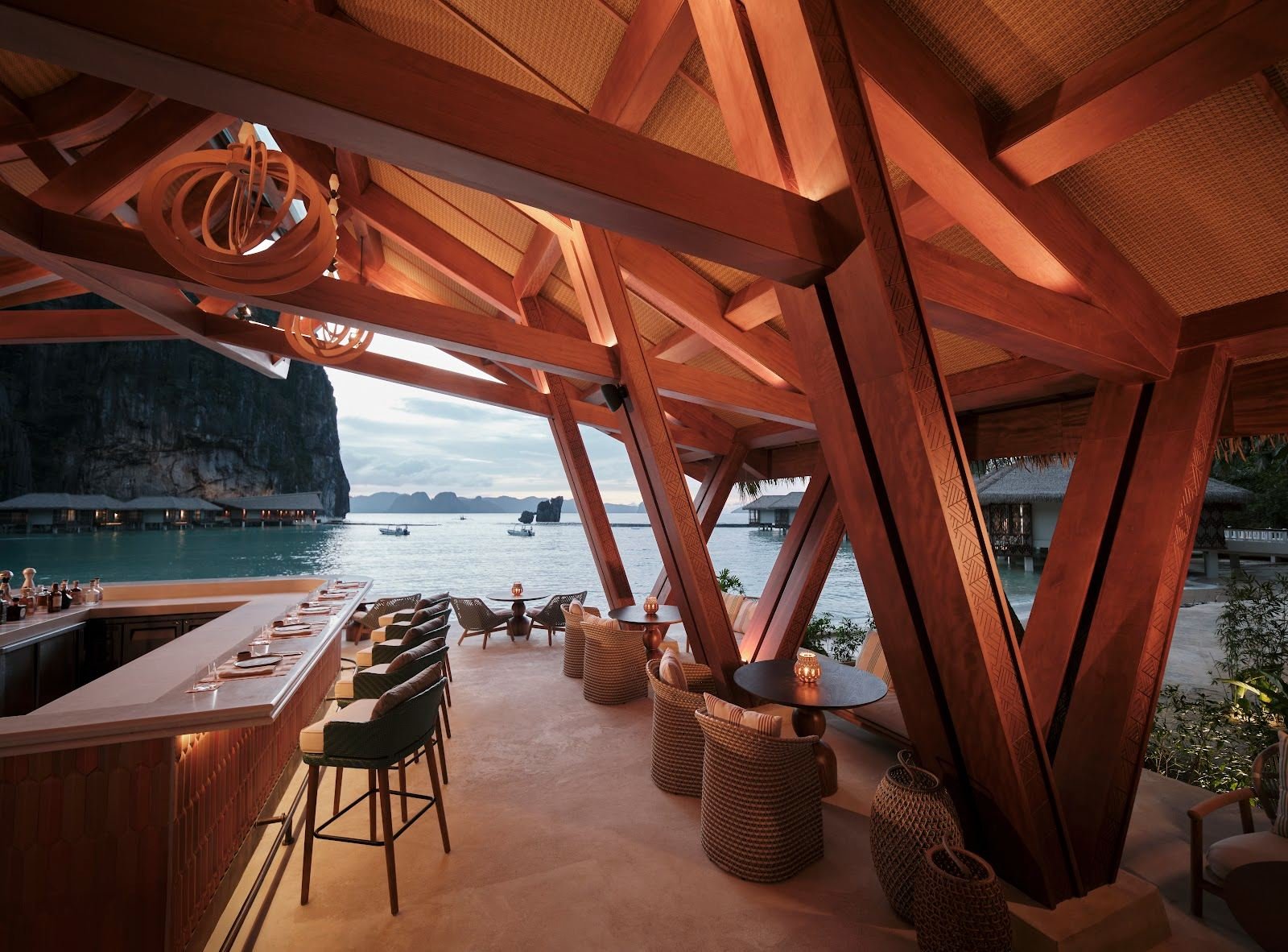 Beach Club with sail-inspired timber roof on the reclaimed beach at El Nido Lagen Resort