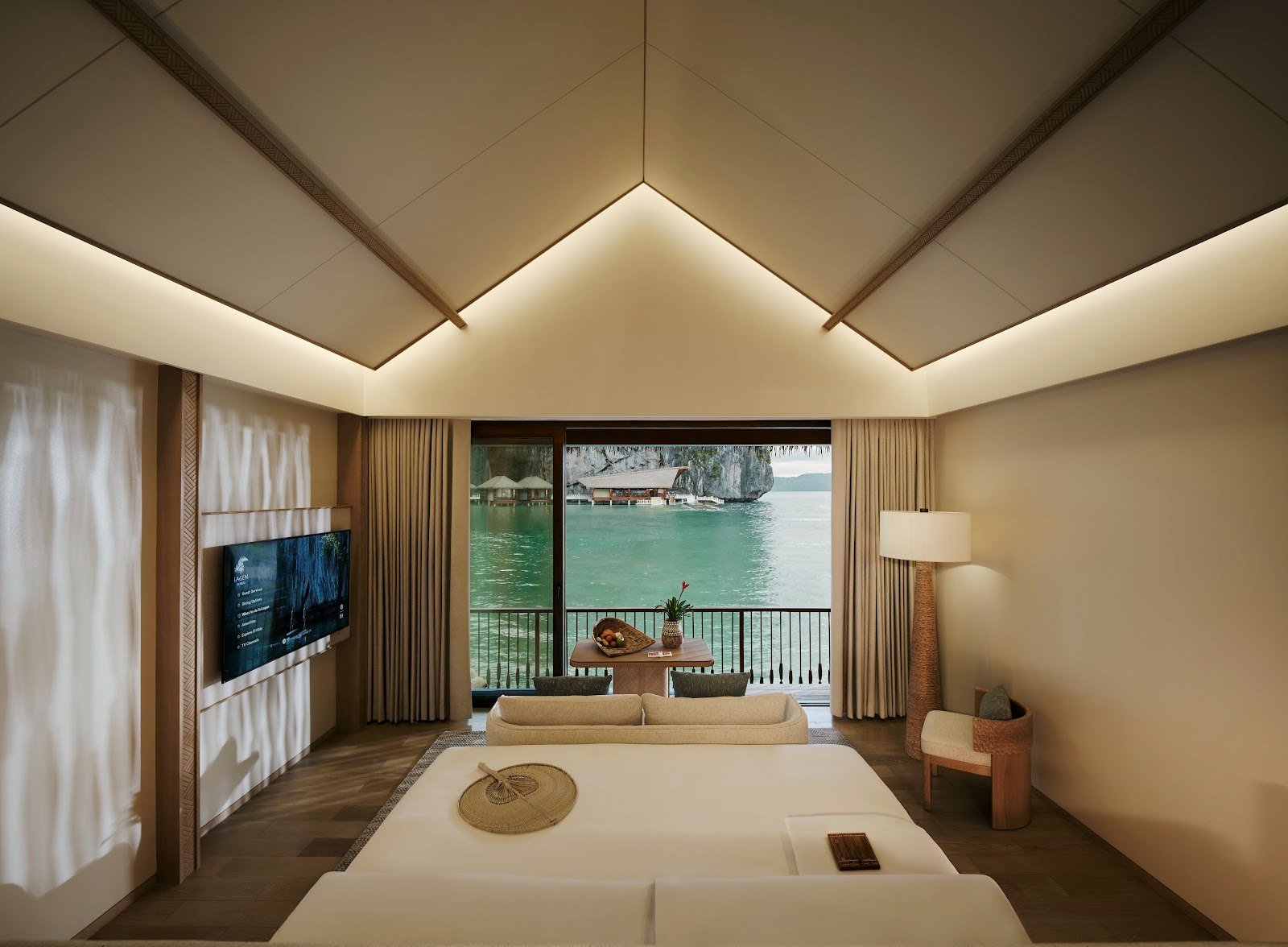 Rebuilt bahay kubo style overwater villa with sunken lounge at El Nido Lagen Resort Palawan