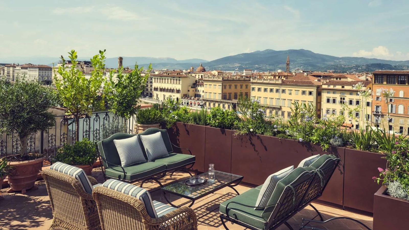 Rooftop terrace with views over the Florence rooftops at La Réserve Firenze