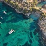 Mallorca's Best-Known Headland Just Got Its Most Ambitious Hotel Aerial view of Mandarin Oriental Punta Negra on the Calvià headland in Mallorca with two private coves