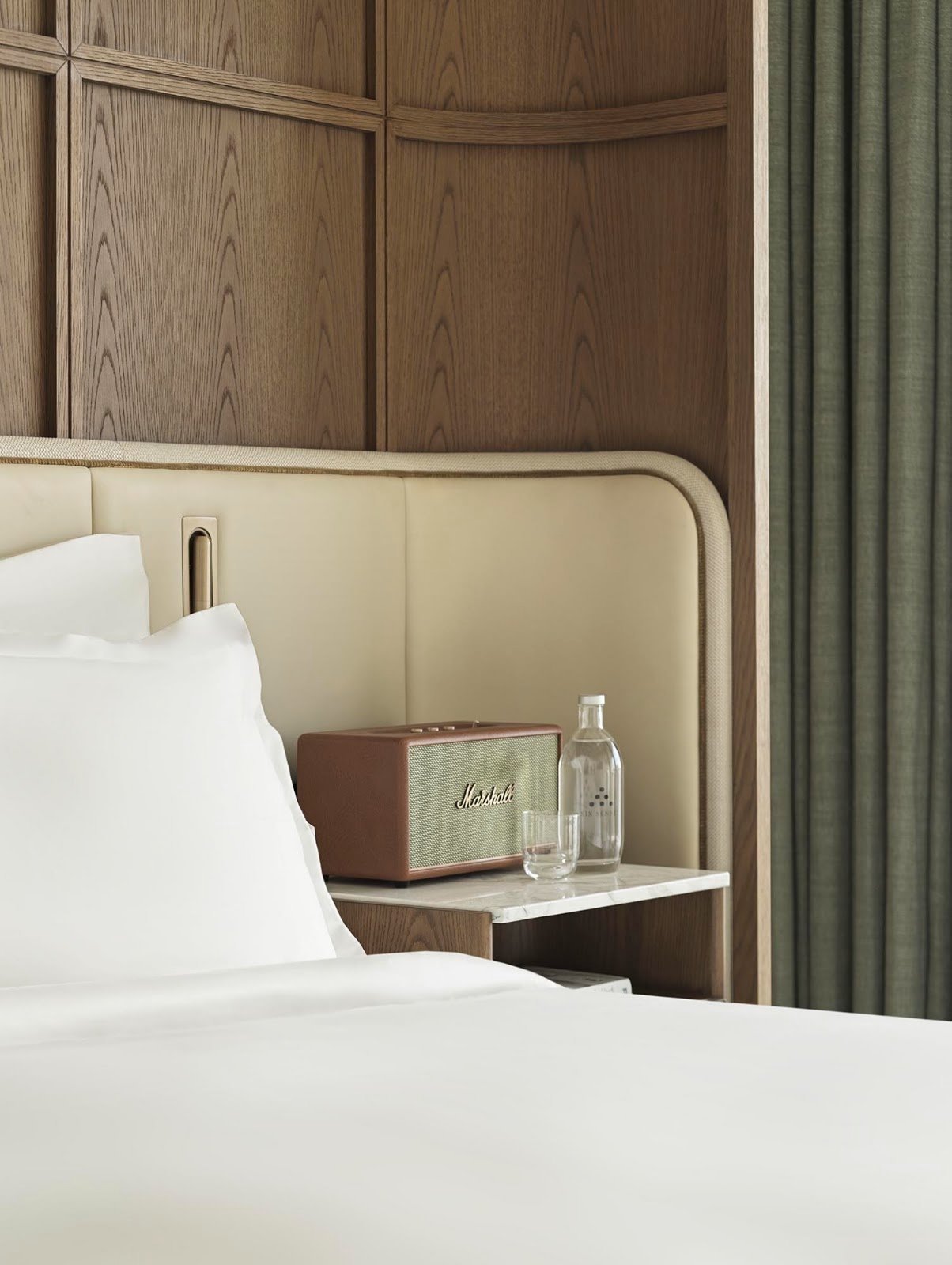 Suite interior with floor-to-ceiling windows at Six Senses The Palm Dubai