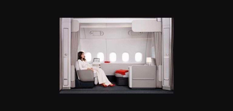 Air France's New La Première Now Flies to Singapore and Tokyo — and Every New York Flight Has It Air France La Première suite on the Boeing 777-300ER, showing the reclining armchair, the separate chaise longue and five windows