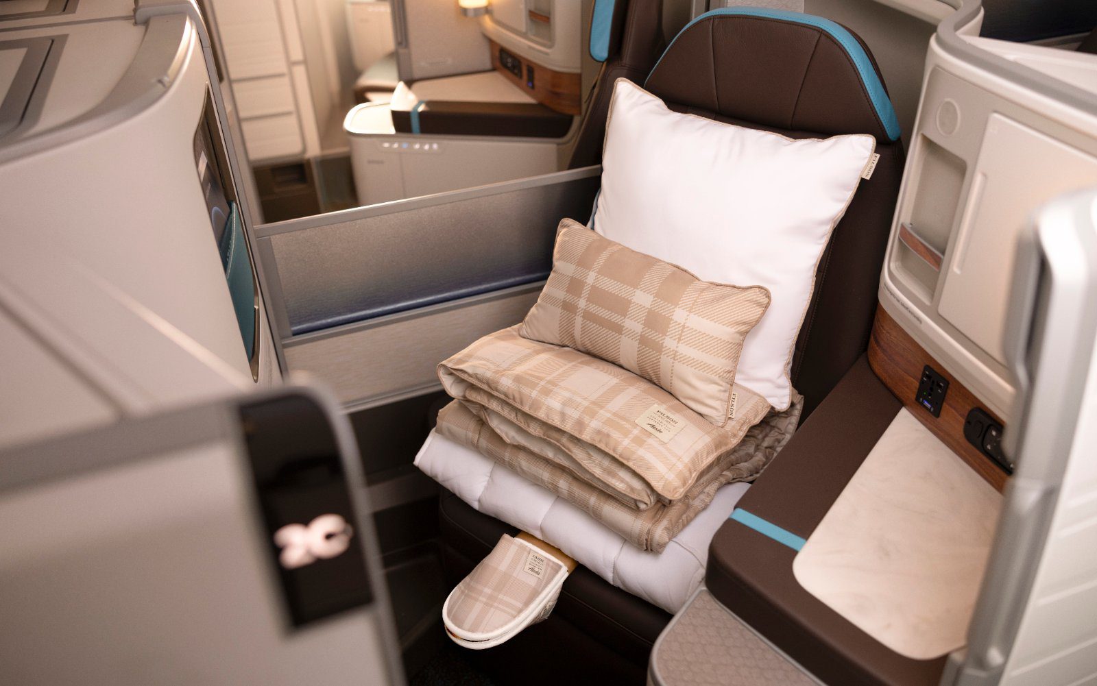 Alaska Airlines Boeing 787-9 business class suite in lie-flat bed mode