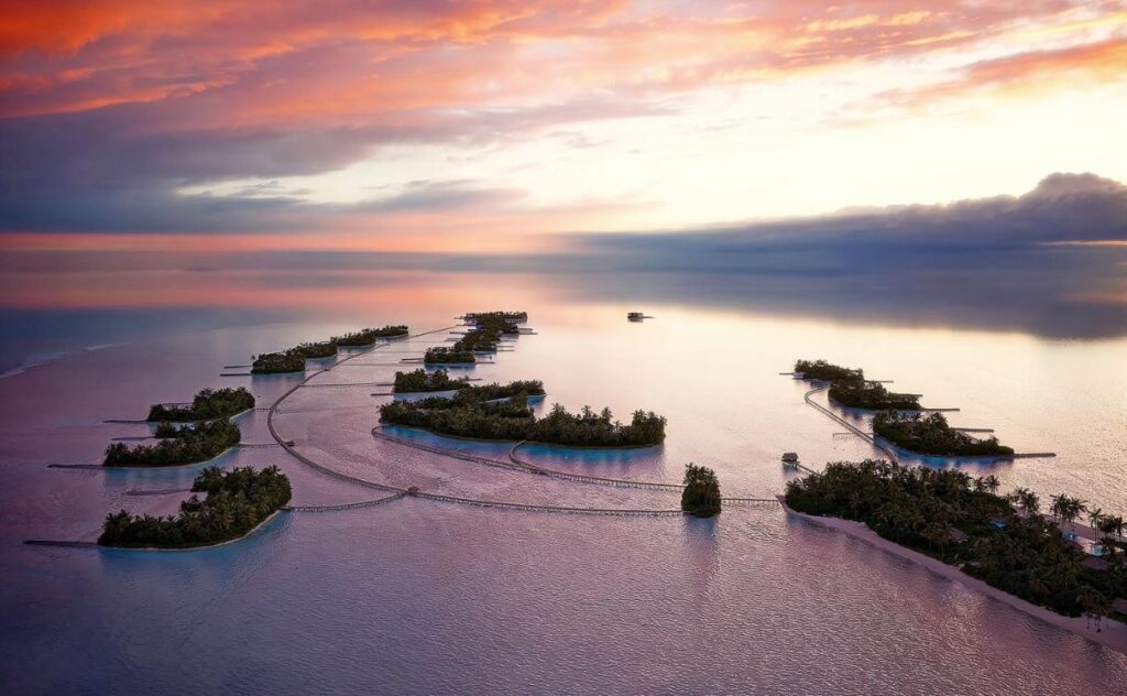 Amanolu Maldives residence islands aerial at sunset, Vaavu Atoll