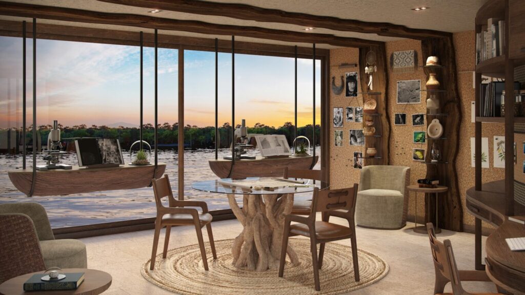 Rendering of the Explorer Centre on andBeyond Amazon Explorer, with a wooden table, microscopes and floor-to-ceiling windows over the river