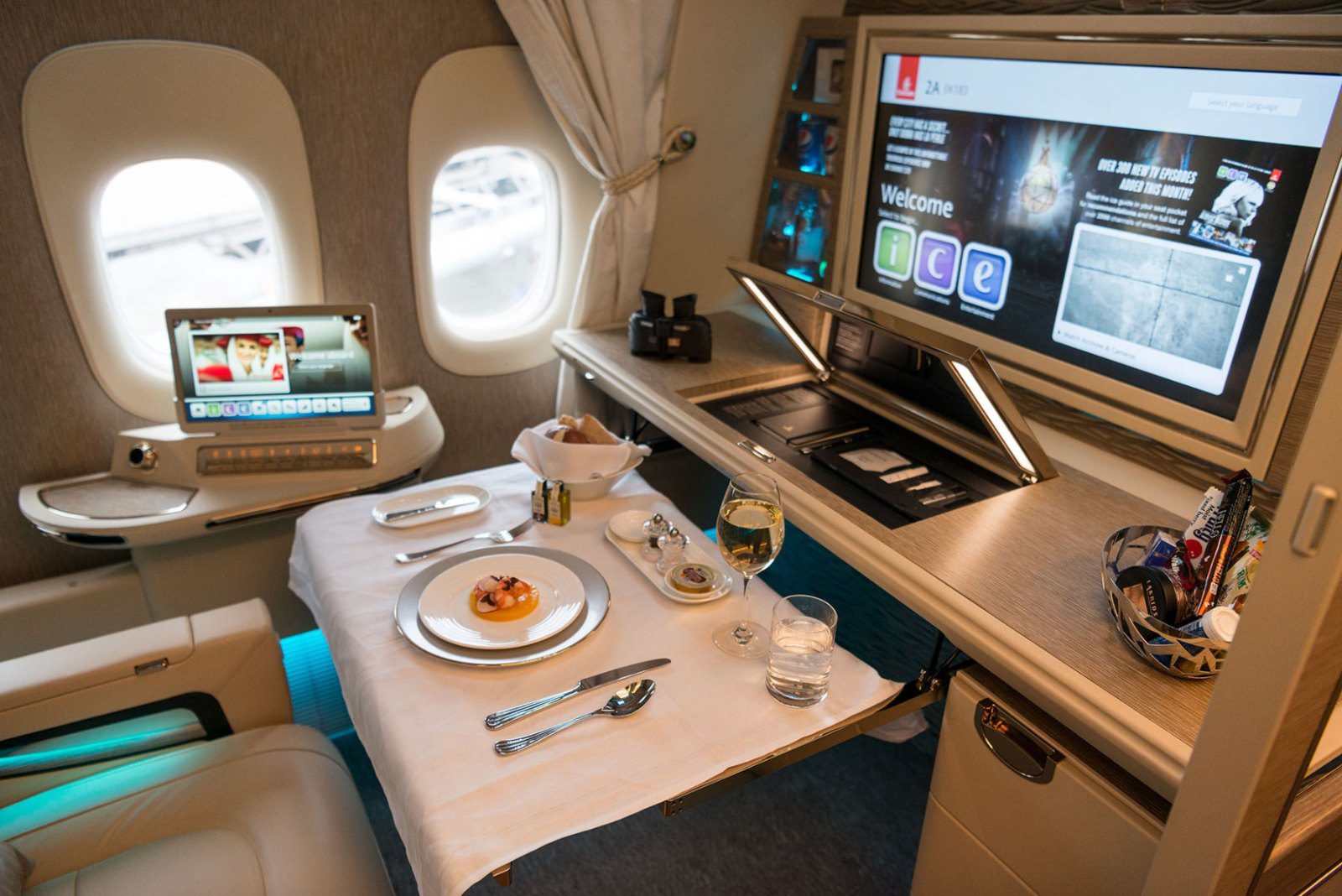 Dining tray set for a meal in an Emirates Boeing 777 First Class suite