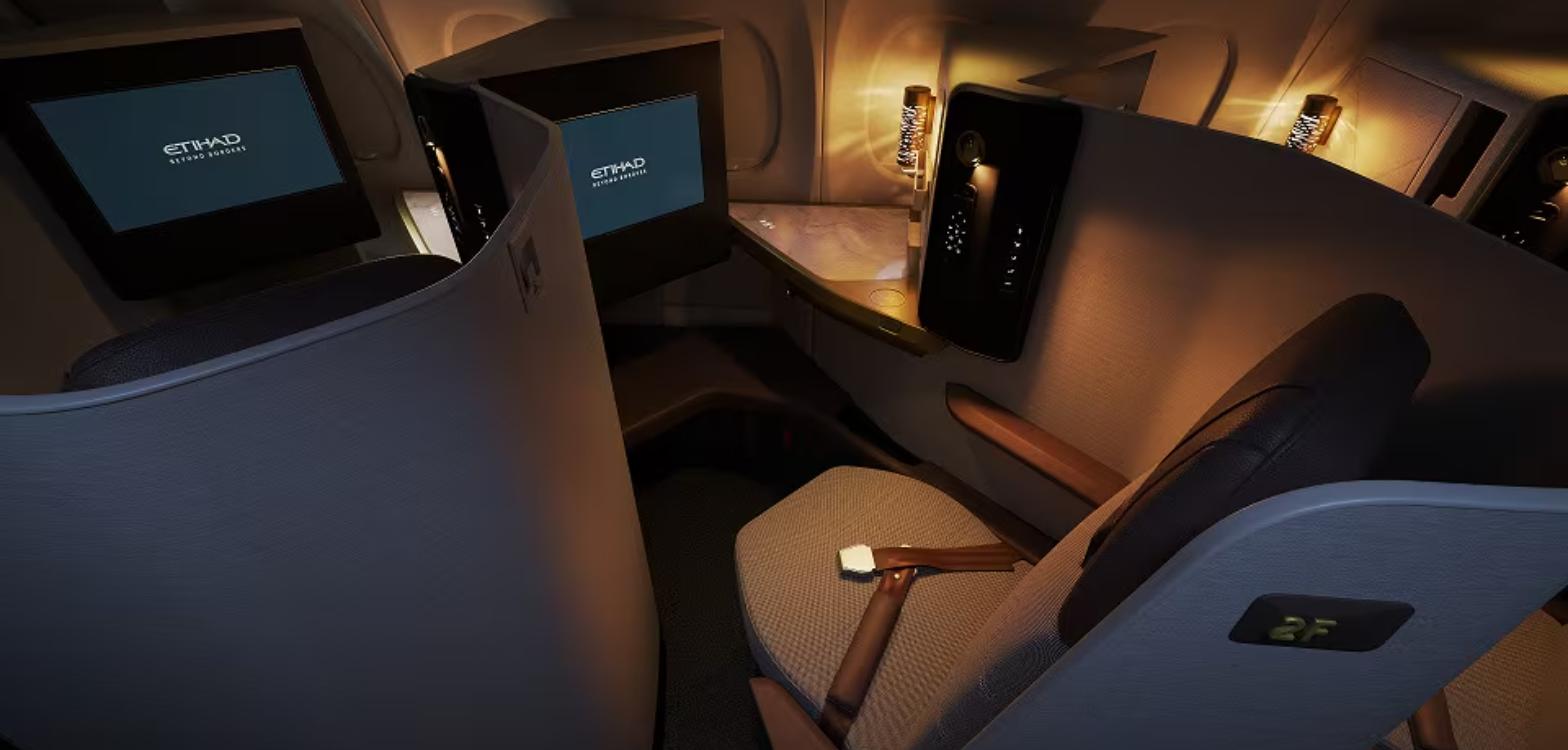 Pair of Etihad A321LR business class suites with privacy shells and large screens