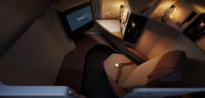 Etihad A321LR first class suite with a closing door, side table and entertainment screen