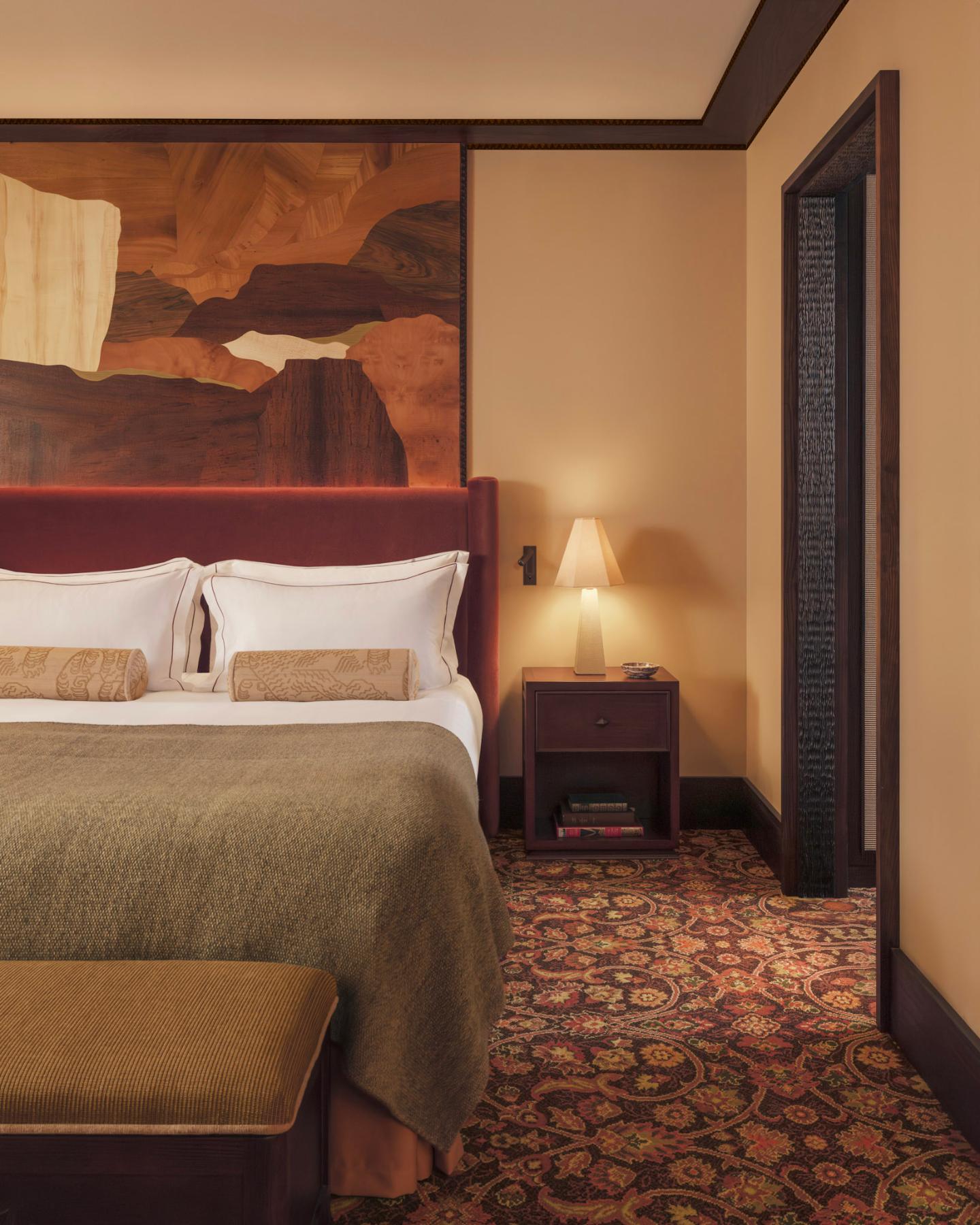 Hôtel Saint Roch Courchevel bedroom with marquetry headboard