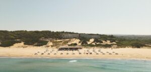 Icona’s Costa Ragusa Resort seen from the sea above its private beach, Sicily