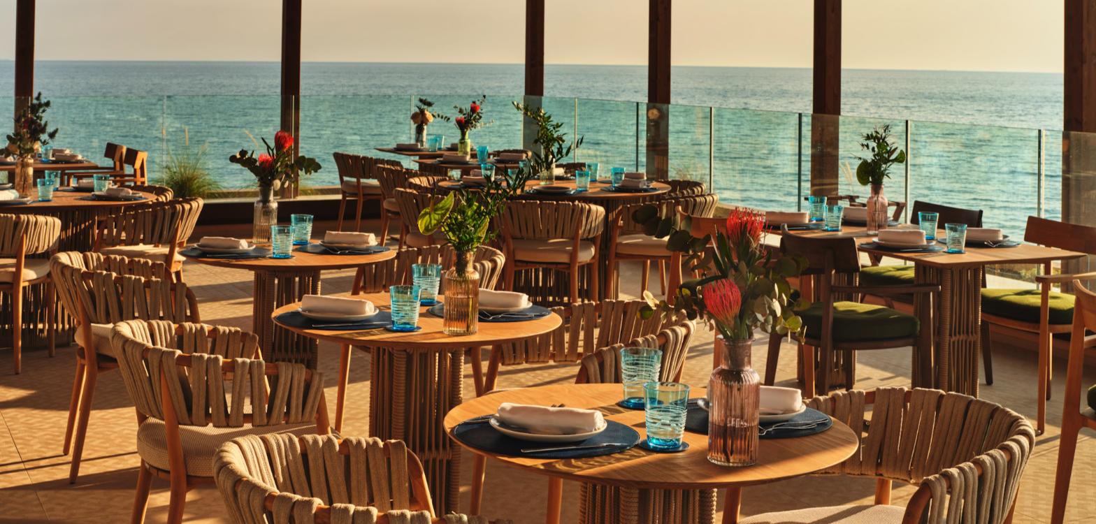 Icona’s Costa Ragusa Resort clifftop restaurant with sea views, Sicily