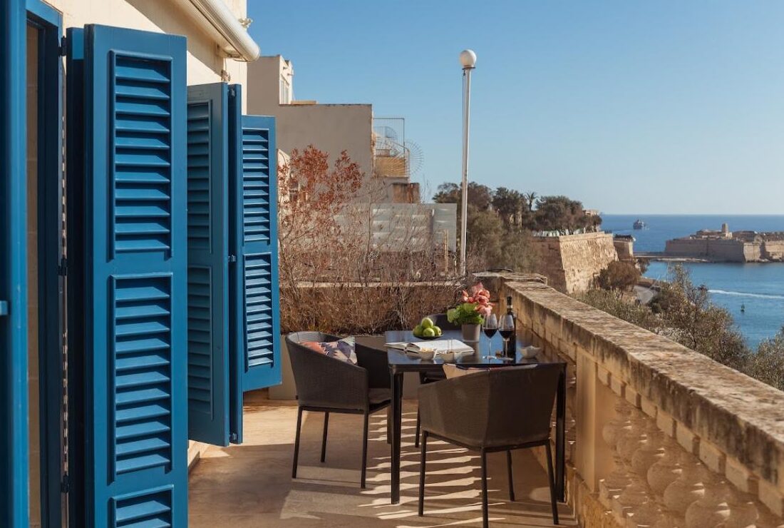 Terrace of the Presidential Harbour View Residence at Iniala Valletta, laid for lunch above the Grand Harbour