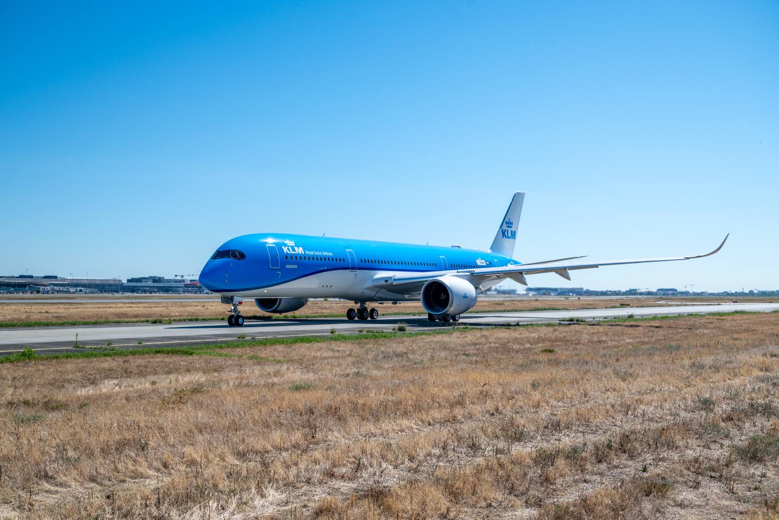 Front three-quarter view of the KLM Airbus A350-900 on the taxiway at Toulouse
