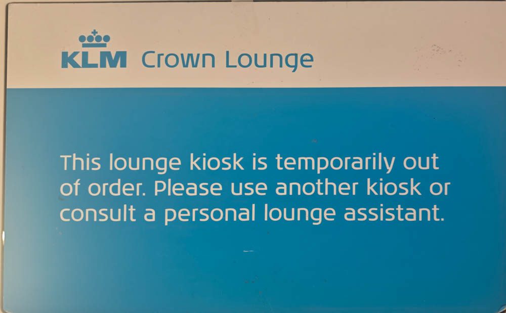 KLM Crown Lounge sign: this lounge kiosk is temporarily out of order
