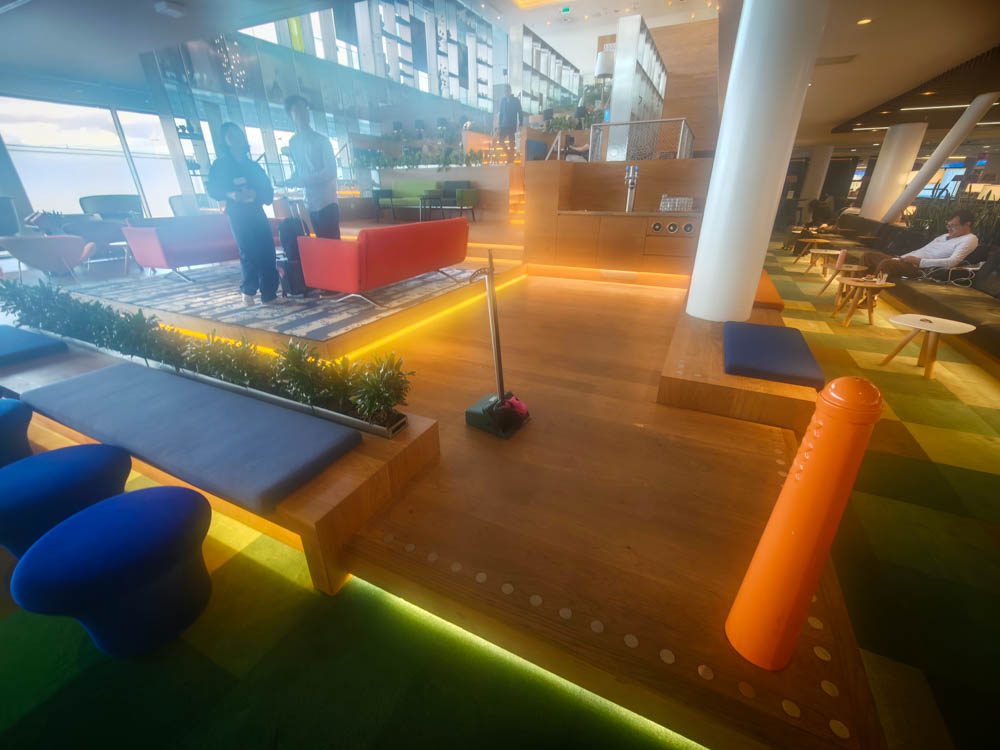 Upstairs seating alcoves at KLM Crown Lounge 52 Amsterdam — the area closes at 8:30pm