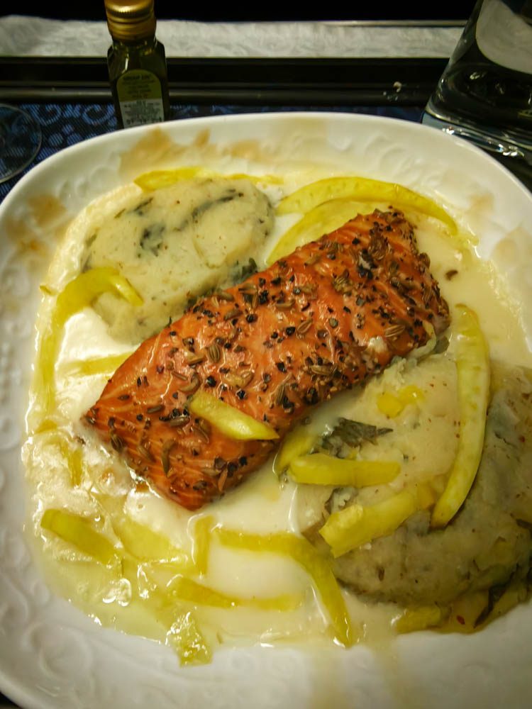 Smoked salmon fillet with fennel on rocket mash in KLM business class