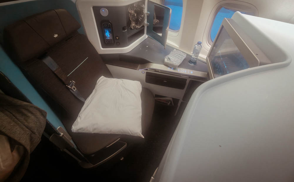 KLM business class review: seat 8A on the Boeing 777-200 with pillow and side console