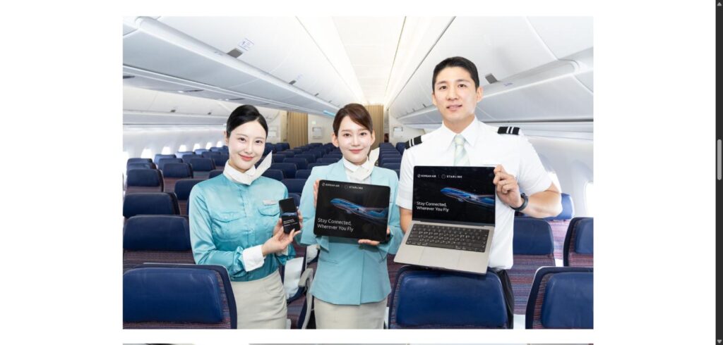 Korean Air cabin crew and a pilot holding tablets on board, marking the Korean Air Starlink Wi-Fi launch in every cabin