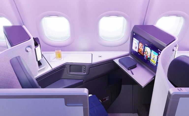 Malaysia Airlines' A330neo Suites Now Fly to Bali, Perth and Brisbane — a Door on Every Seat, Three Hours From Denpasar Malaysia Airlines A330neo Business Suite with sliding privacy door, side table and 4K screen