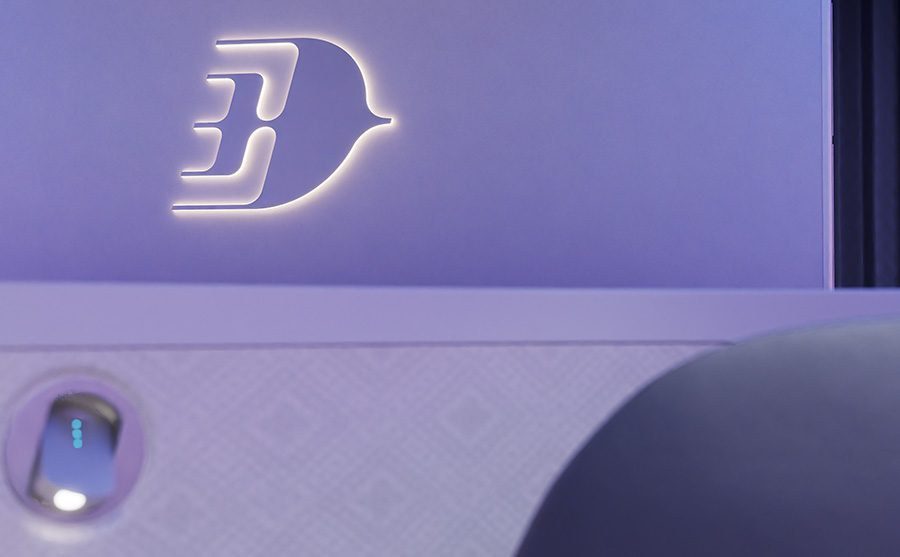 Malaysia Airlines logo detail in the A330neo cabin with songket-inspired trim