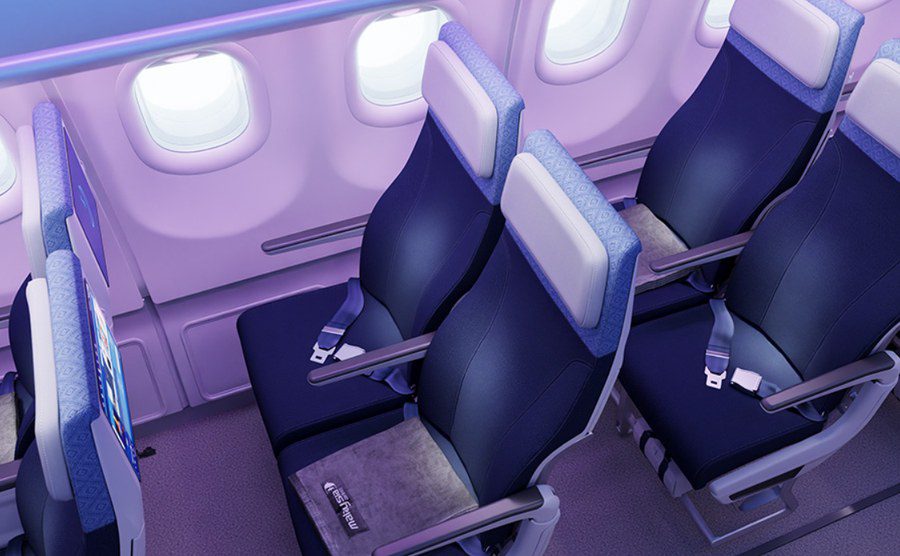 Malaysia Airlines A330neo economy class seats with seatback screens and ambient lighting