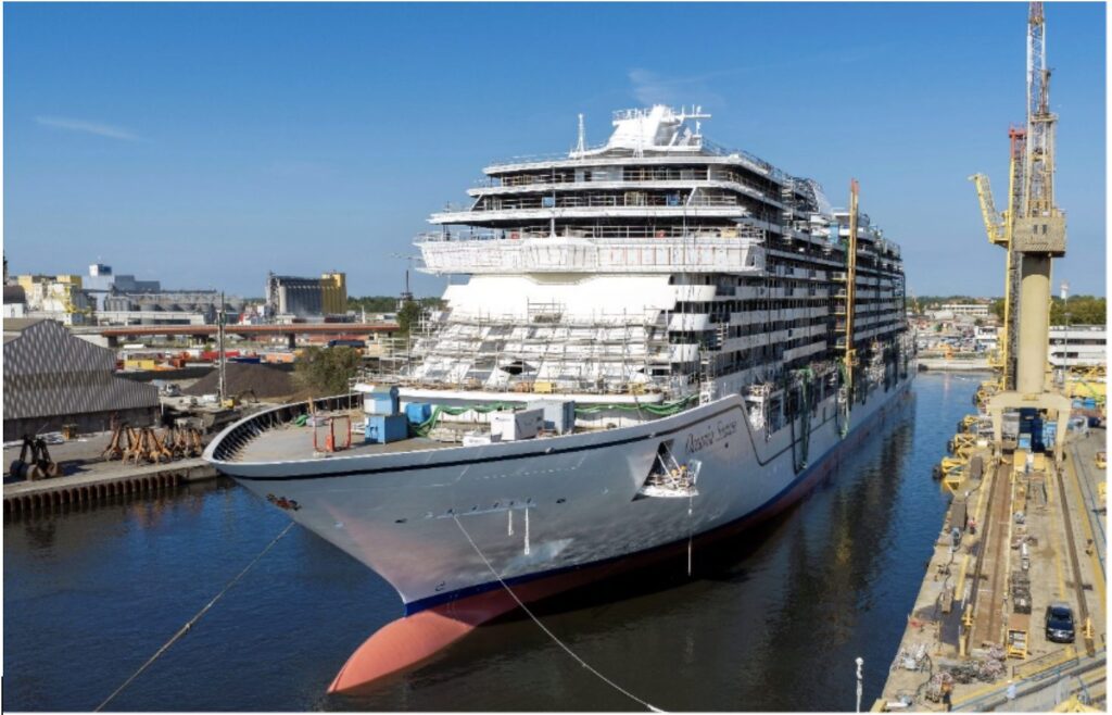 Oceania Sonata afloat alongside a crane at Fincantieri's Marghera shipyard after her float-out in August 2026