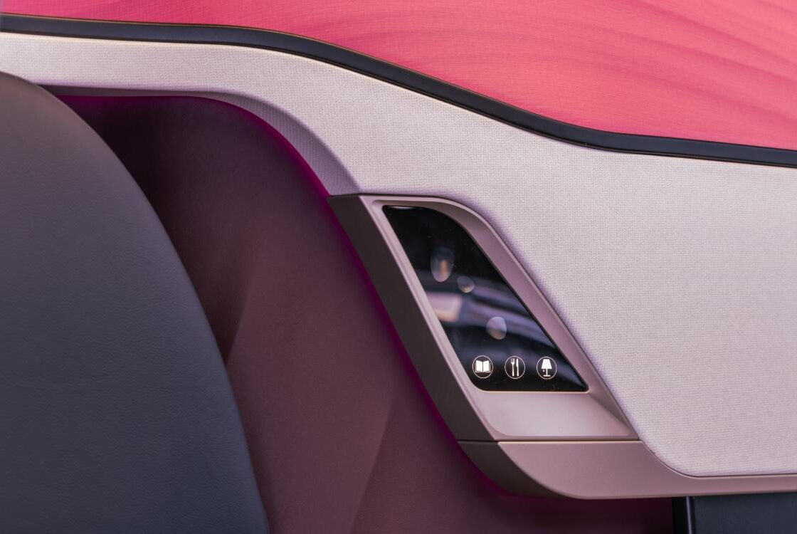 Close-up of the Qsuite Next Gen service panel with reading light, dining and crew call icons