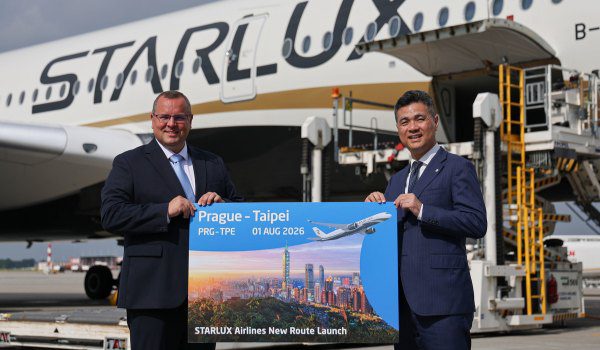 STARLUX and Prague Airport executives holding a Prague to Taipei route launch board beside a STARLUX aircraft