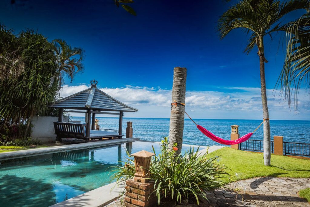 The Joglo by the Sea, an antique Javanese teak house in a beachfront garden in Lovina