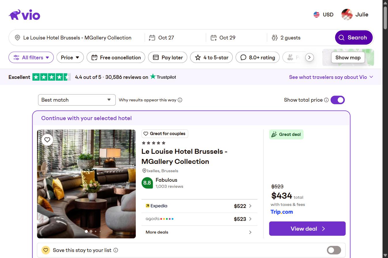 Vio.com search results for Le Louise Hotel Brussels showing $434 total via Trip.com against Expedia $522 and Agoda $523, 15 September 2026
