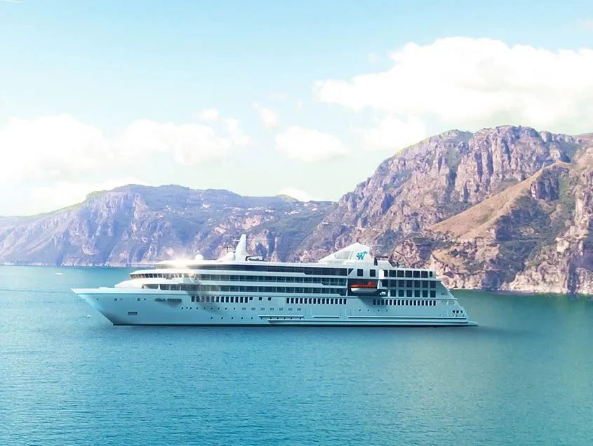 Rendering of Star Explorer under way in calm water beneath a mountainous coastline