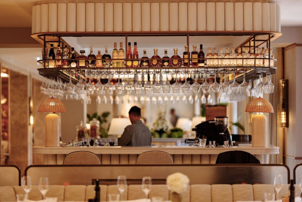 The bar with its brass-and-glass counter at The Bristol Bol, Brac