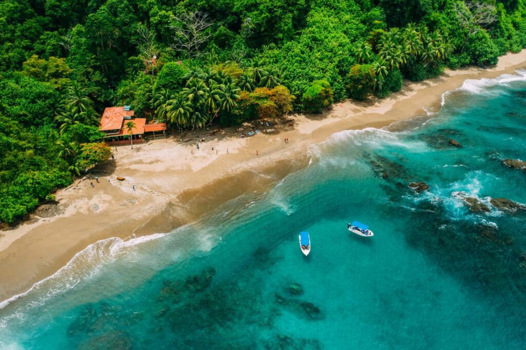 Aerial view of a beach and turquoise sea on the Costa Rican coast