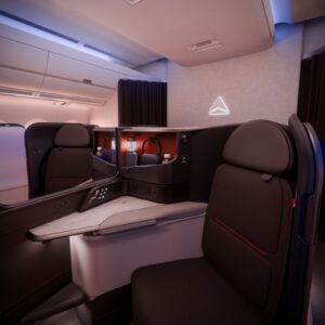 Rendering of the new Delta One Suite for the Airbus A350-1000, a centre pair of suites with storage, screens and amenities — not the A350-900 suite used on Delta Atlanta Riyadh flights