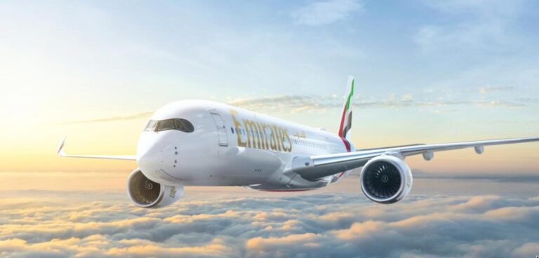Emirates Brings the A350 to America: Dubai–Orlando From 1 November With 32 Business Seats, Premium Economy and No First Class Emirates Airbus A350-900 in flight above the clouds at sunrise
