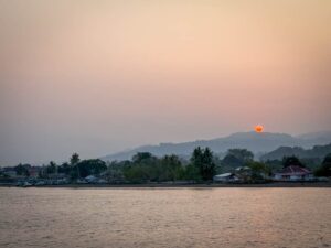 Sun setting through haze near Ambon