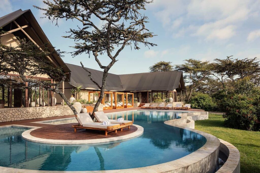 Pool and loungers at the Spa by JW, JW Marriott Mount Kenya Rhino Reserve Safari Camp