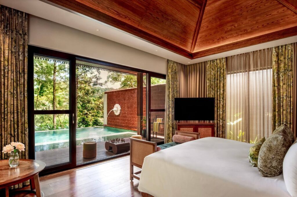 Villa bedroom interior at The Leela Coorg Forest Sanctuary