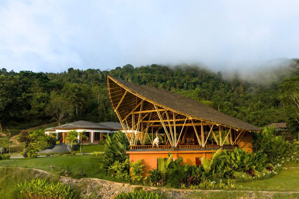 Yoga on the Vinyasa deck overlooking the lake at The Leela Coorg Forest Sanctuary