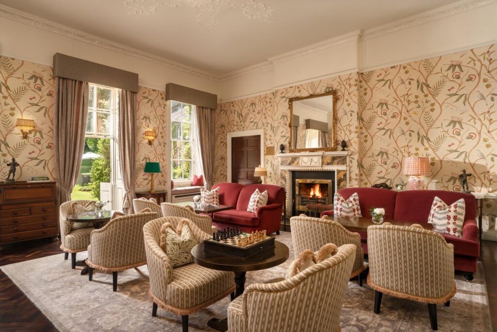 Restored drawing room with open fire at the Manor, Mount Juliet Estate, Kilkenny
