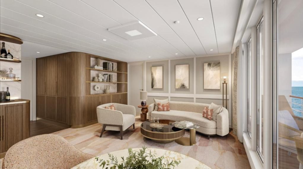 Rendering of a lounge on Oceania Aurelia with a curved sofa, bookshelves and floor-to-ceiling sea views